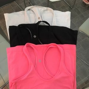 Lululemon racerback tanks - pink, black, and white